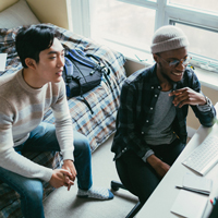 two male students studying